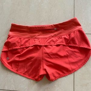 Red/orange Lululemon size 4 speed up shorts